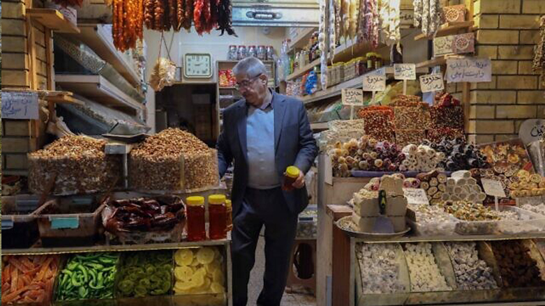 An Iraqi man sells nuts in the old bazaar in Erbil, the capital of the northern Iraqi Kurdish autonomous region, on February 10, 2021. (Photo: Safin Ahmed/AFP)